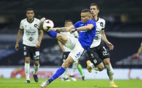 Jonathan Rodriguez of Cruz Azul kicking the ball for a goal during a Mexico soccer league match.