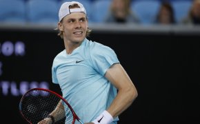 Canada's Denis Shapovalov reacting to winning a point on the court during a match at the Australian Open.