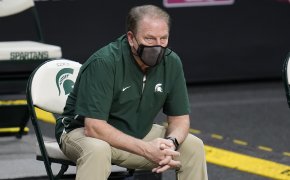 Tom Izzo sitting with mask on