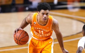 Tennessee's Jaden Springer dribbling the ball on offense during a NCAA men's basketball game.