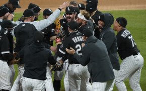 Chicago White Sox pitcher Carlos Rodon celebrating with teammates after throwing a no-hitter