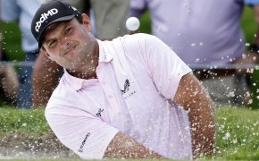 Patrick Reed plays out of the bunker