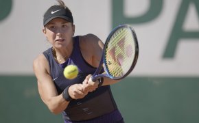 Belinda Bencic hitting a return during her first round match at the 2021 French Open.