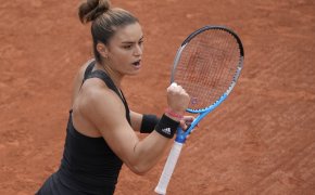Maris Sakkari celebrating with a fist pump after she wins a point during a match at the French Open.