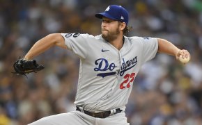 Clayton Kershaw throwing a pitch during a MLB game.
