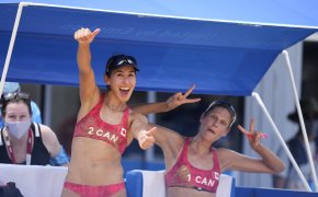Sarah Pavan and Melisa Humana-Paredes celebrating after winning their beach volleyball match