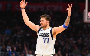 Luka Doncic hands up in the air