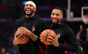 Carmelo Anthony and Damian Lillard share a laugh