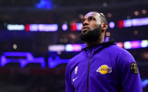 LeBron James stands for the anthem