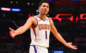 Devin Booker arms out