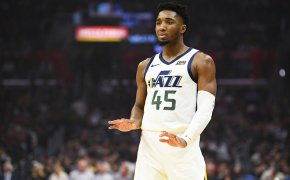 Donovan Mitchell palms out to the ground