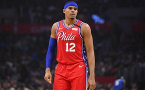 Tobias Harris rests during a stoppage in play
