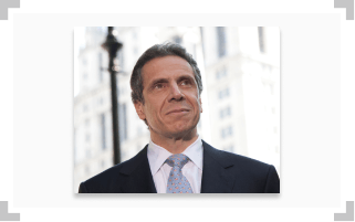 Governor Andrew Cuomo in suit and tie