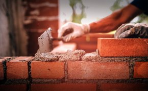close up images of bricks being layed