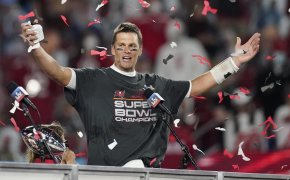 Tampa Bay Buccaneers quarterback Tom Brady celebrating after winning the Super Bowl.