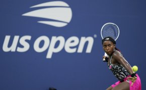 Cori Gauff returning a shot during a match at the US Open.