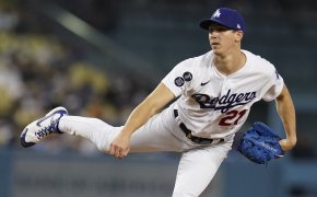 Los Angeles Dodgers pitcher Walker Buehler following through on a pitch during a game.