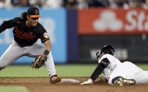 New York Yankees' Aaron Judge sliding into second base head first against the Baltimore Orioles.