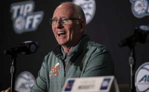 University of Miami head coach Jim Larranage smiling during a press conference.