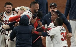 Atlanta Braves' Eddie Rosario celebrates a walk-off hit