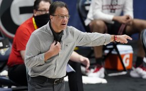 Tom Crean pulling mask down and talking