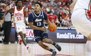 Akron's Xavier Castaneda driving to the hoop