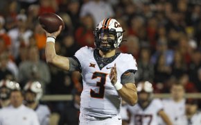 Oklahoma State's Spencer Sanders throwing a pass
