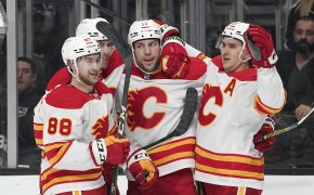 Flames players celebrating goal