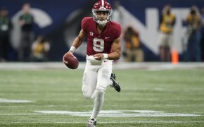 Alabama quarterback Bryce Young running with the football