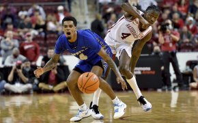 Hofstra guard Aaron Estrada reacting after getting fouled by an Arkansas defender