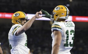 Aaron Rodgers touches hands with Alan Lazard in TD celebration