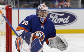 New York Islanders goaltender Ilya Sorokin preparing in front of the net prior to a game.