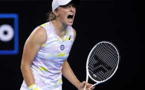 Iga Swiatek reacting after winning a match at the Australian Open.
