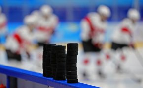 Pucks stacked pre-game, Ice Hockey 2022 Beijing Olympics