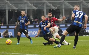 AC Milan's Olivier Giroud, second from right, scores