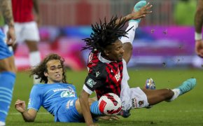 Nice's Khephren Thuram is tackled by Marseille's Matteo