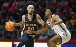 Murray State's Tevin Brown driving past a defender