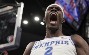 Memphis' Jalen Duren yelling in celebration after a dunk