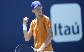 Jannik Sinner fist pumping during a tennis match at the Monte-Carlo Masters.