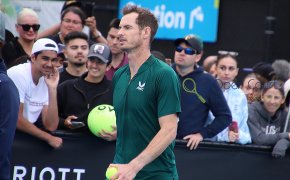 Andy Murray signs some autographs