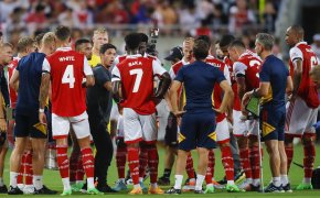 Arsenal head coach Mikel Arteta talks to his players