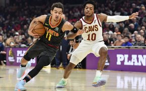 Trae Young drives on Darius Garland