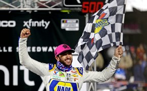 NASCAR Cup Series driver Chase Elliott celebrates winning the Xfinity 500