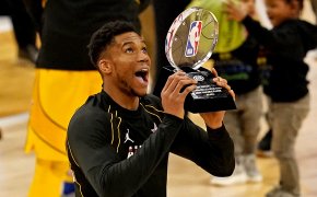 Giannis Antetokounmpo lifting the NBA All Star MVP trophy last year.