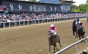 Flavien Prat aboard Rombauer wins the 146th running of the Preakness Stakes