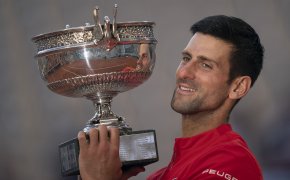 Novak Djokovic holding trophy