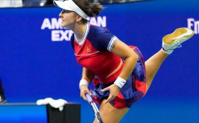 Bianca Andreescu hitting a return during a tennis match.