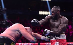 Deontay Wilder lands a punch in the boxing ring