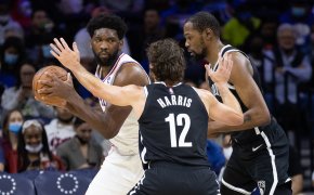 Joel Embiid double-teamed by Joe Harris and Kevin Durant