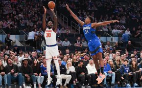 New York Knicks forward Julius Randle shooting a three against Orlando